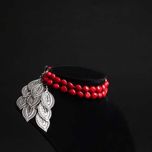Stylish jewelry on stand